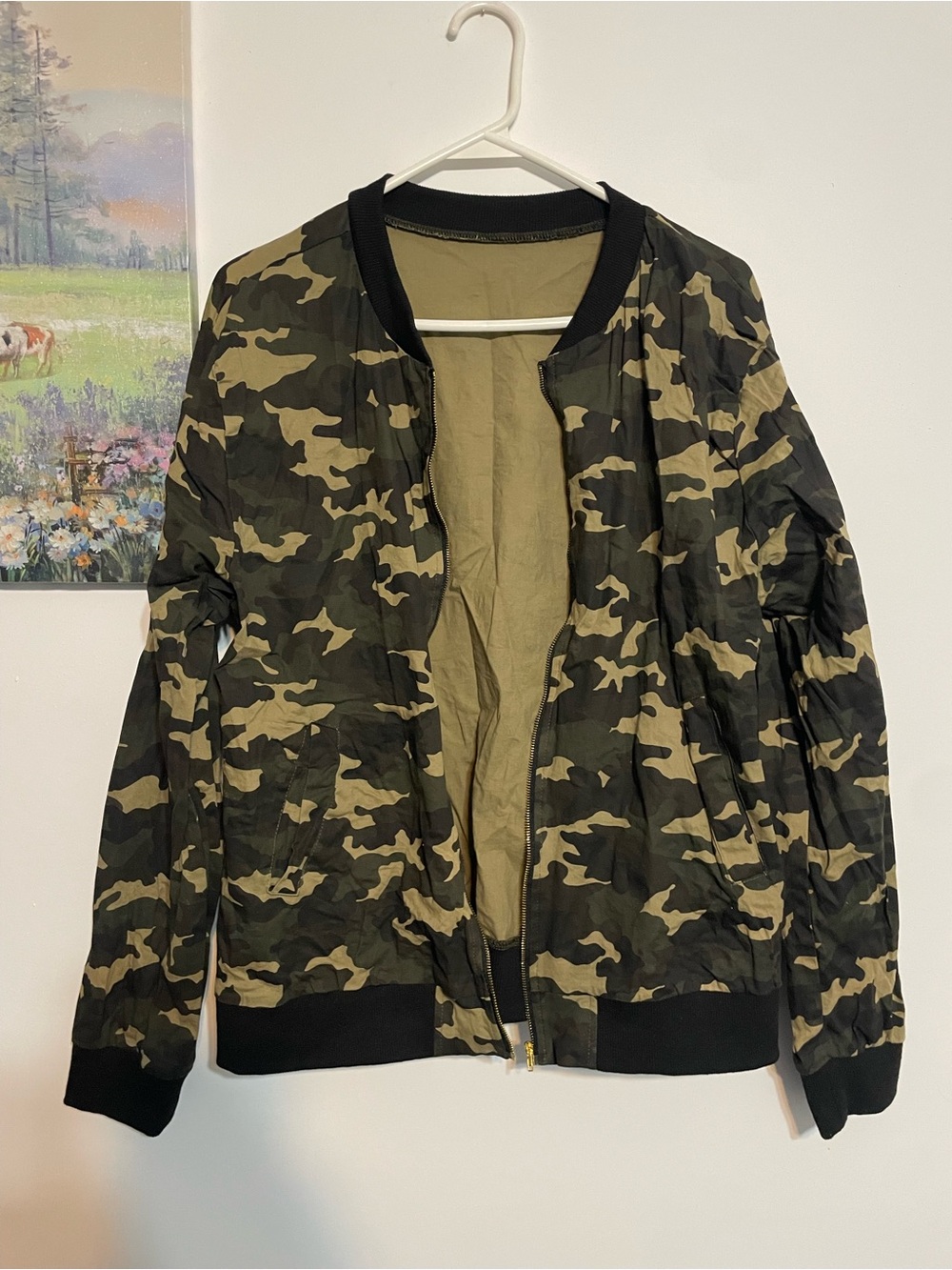 Camo bomber jacket with zipper pockets